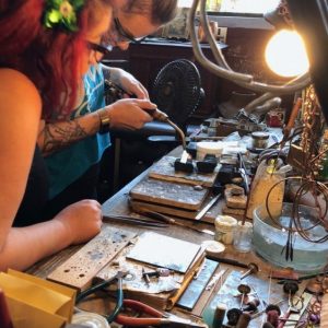 Take metalsmithing classes to make jewelry