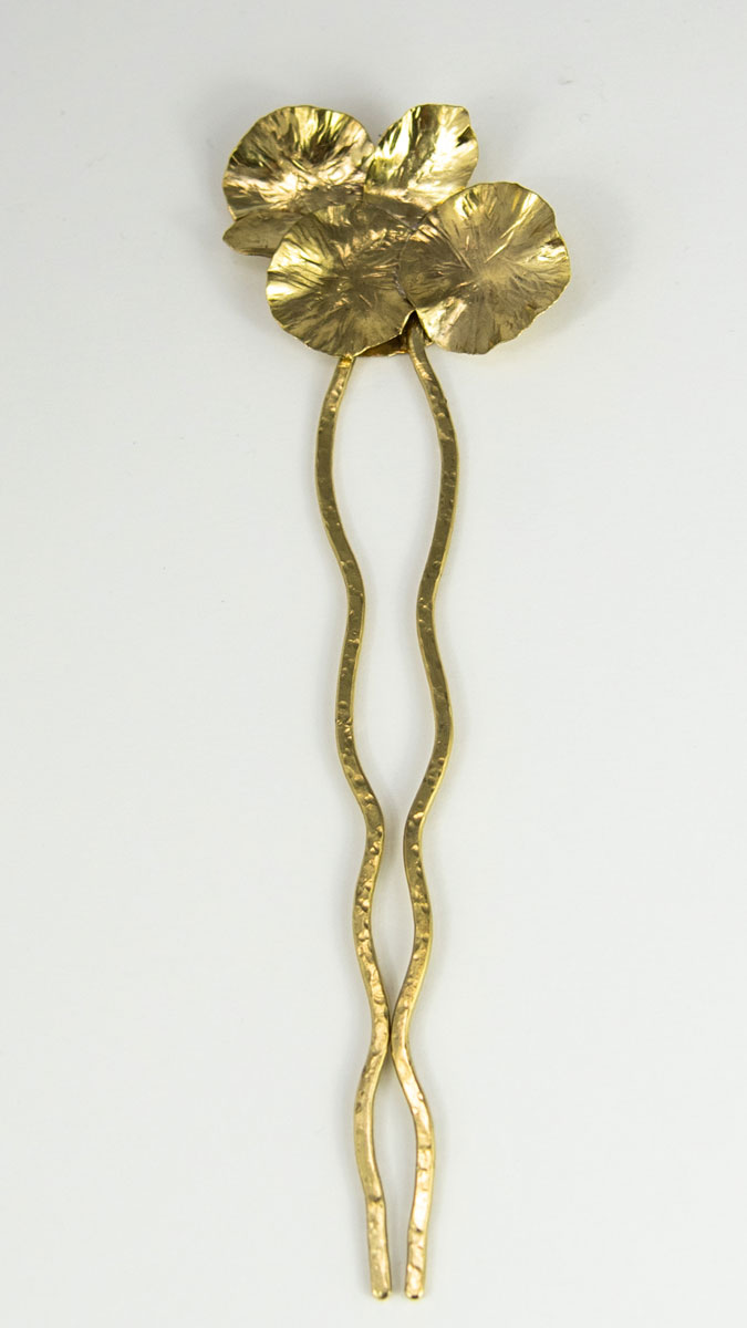This stylish Brass Hair Fork Ikebana adds a bold artsy touch to a bun or any up-do hair styles. Full view.